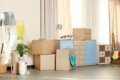 Professionals assisting with a home move in Highbury