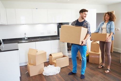 Experienced staff handling items for storage